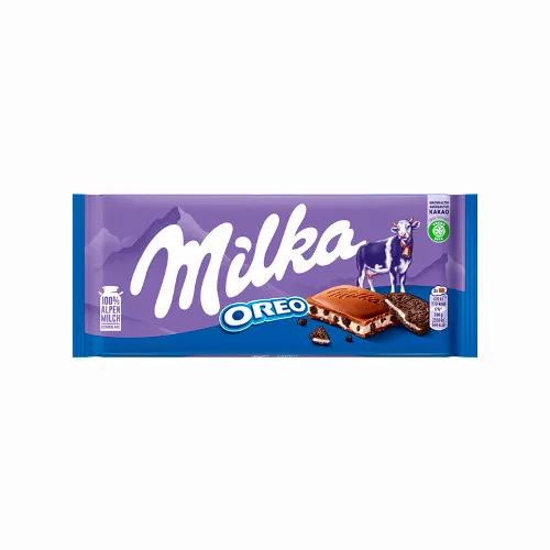 Milka Oreo alpesi tejcsokoládé kakaós kekszdarabokkal és vaníliaízű tejes krémtöltelékkel 100 g